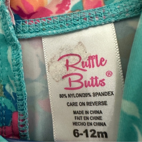 Ruffle Butts 6-12 Months Swimsuit Long Sleeve Rash Guard Floral Blue Pink - Picture 2 of 3